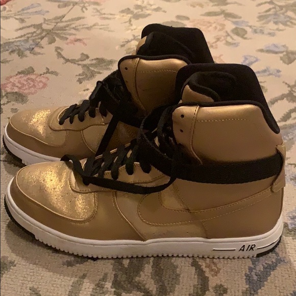 gold nike air force ones